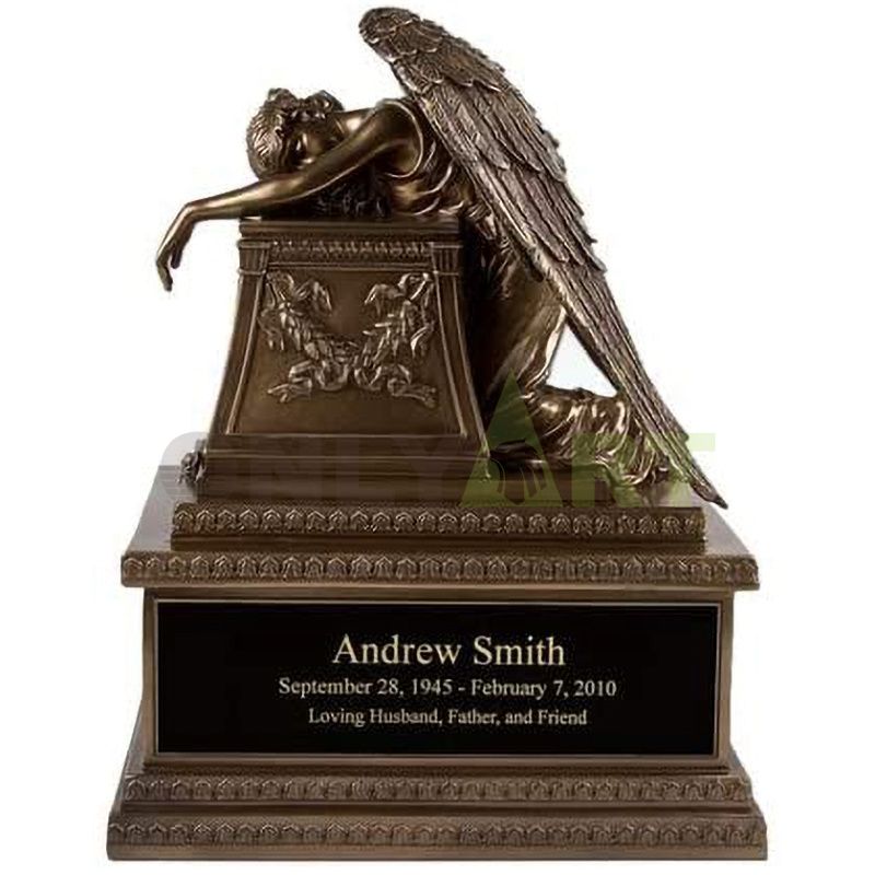 The popular hand-made bronze angel of hell is decorated with mourning statues
