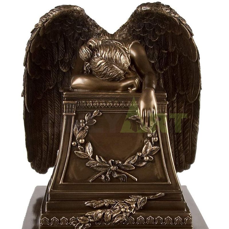 A bronze statue of a quiet little angel