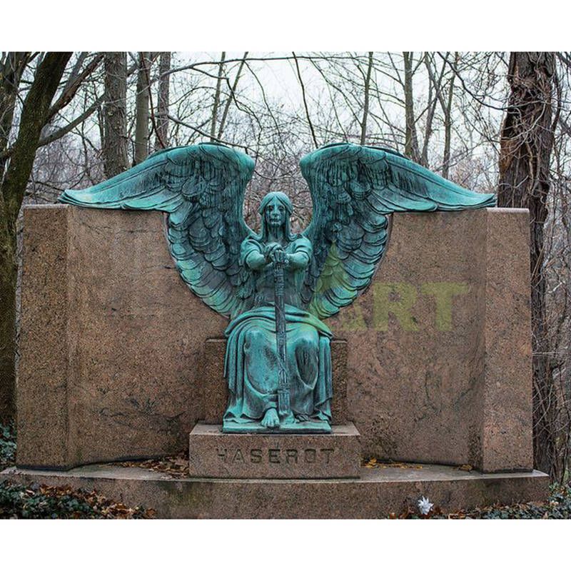 A bronze bust of the Angel of Death