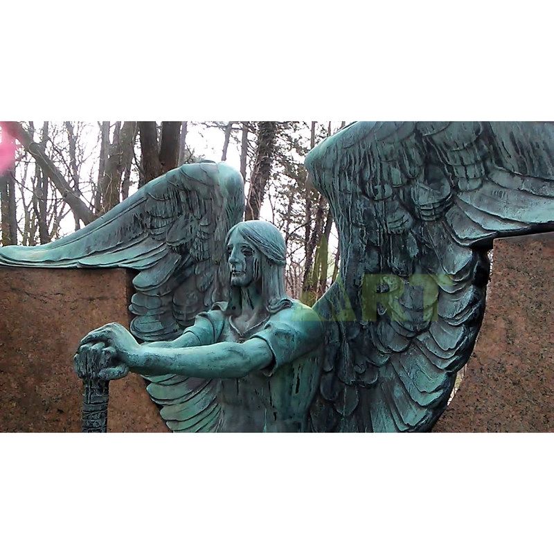 A bronze bust of the Angel of Death