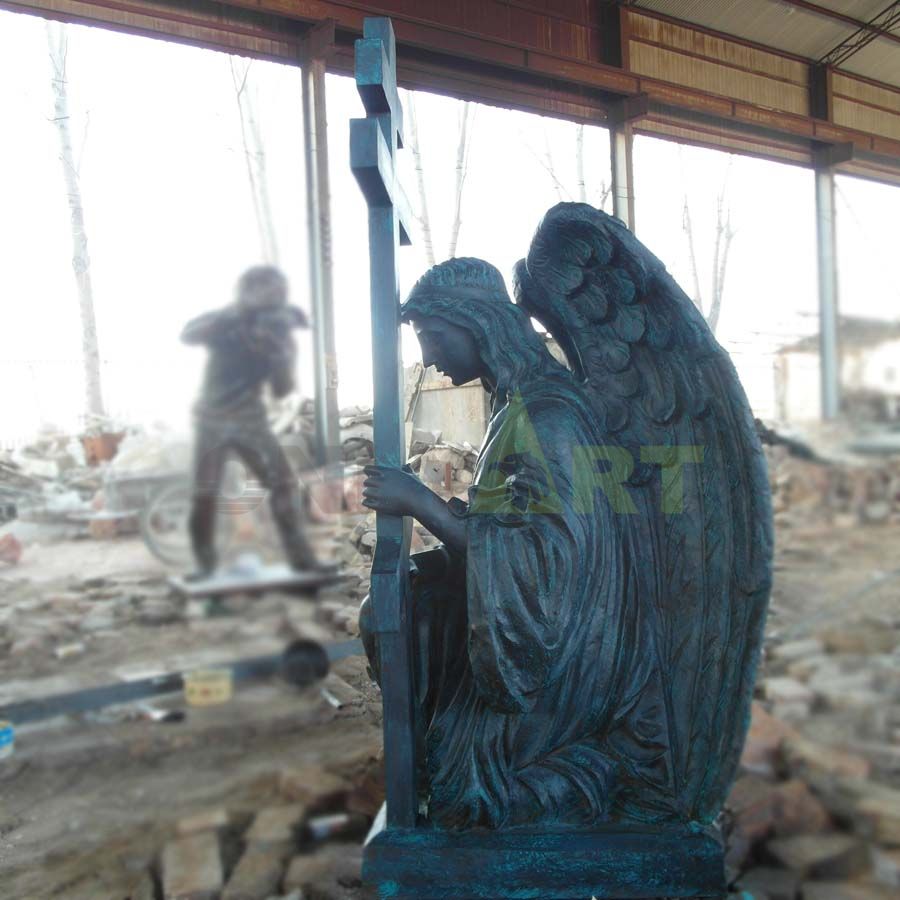 A mourning sculpture of a religious angel