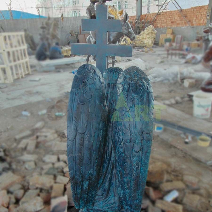 A sculpture of a religious girl angel's side face