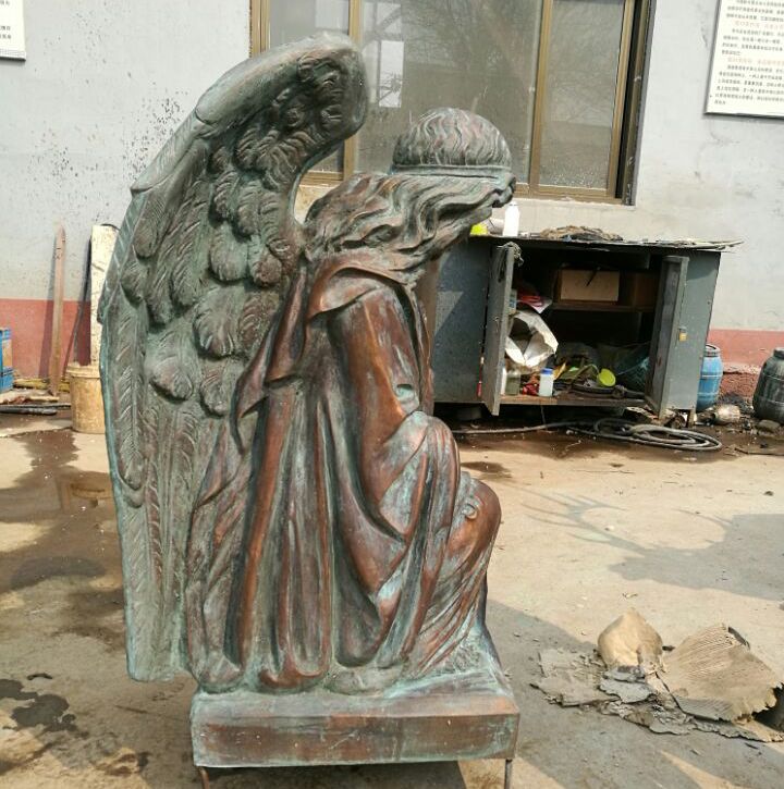 A brooding statue of a Nun's Angel