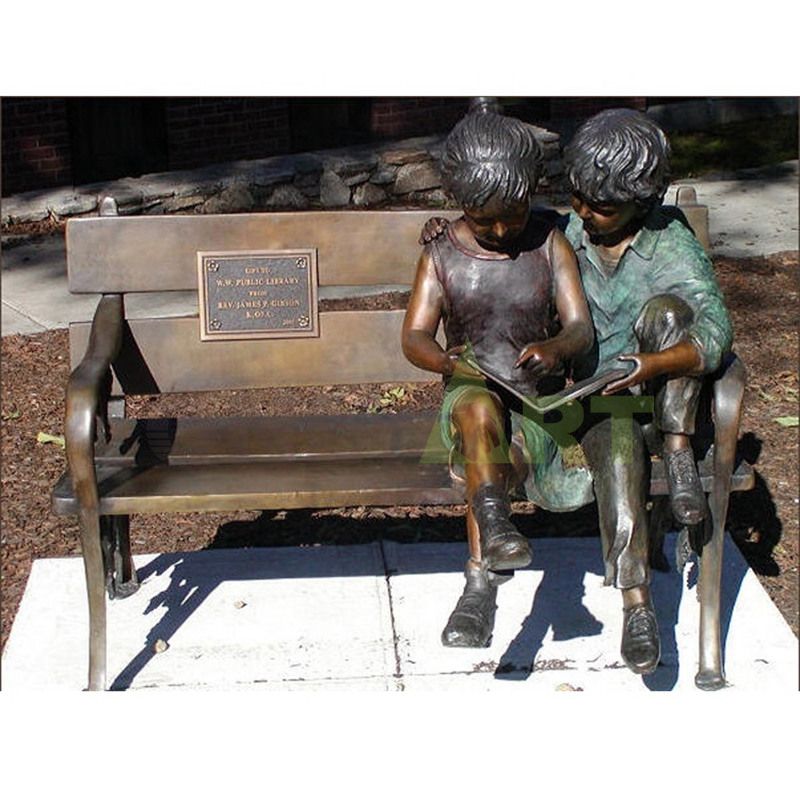 Boys and girls reading together, children sculpture