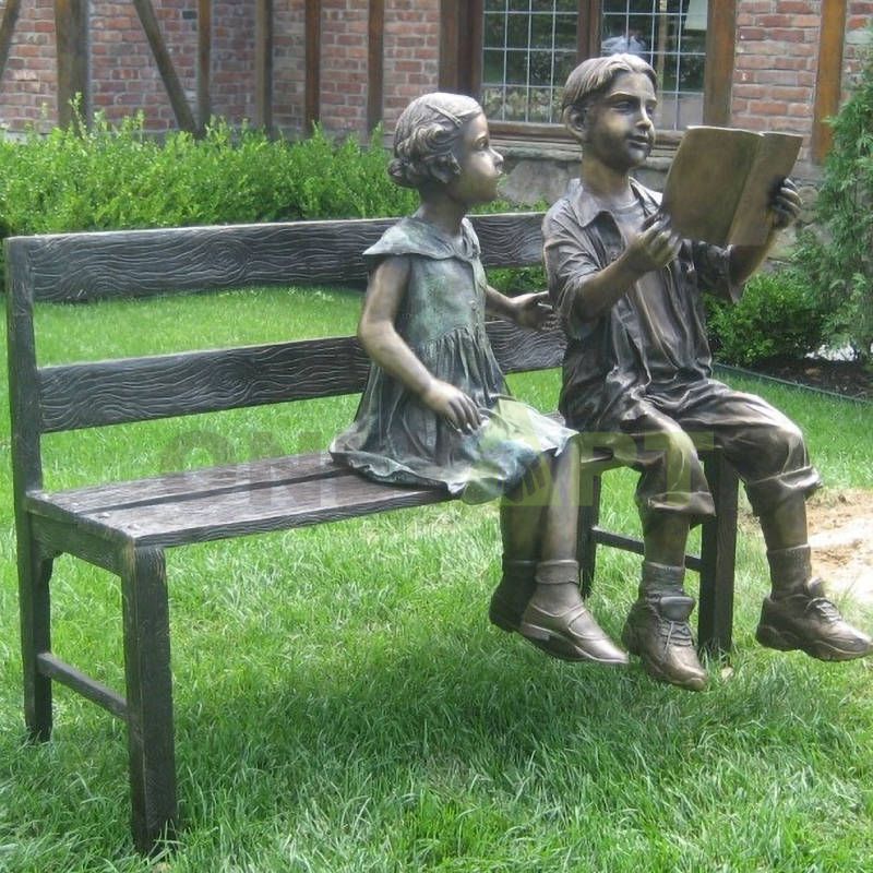 Two children and birds play really happy, children sculpture