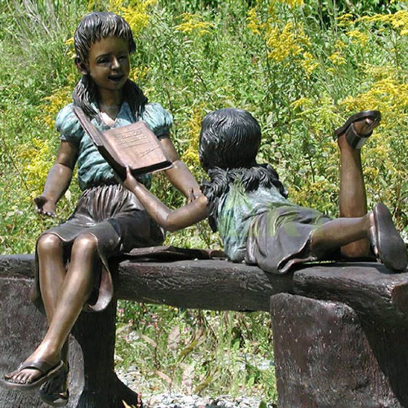 Puppies read with me on the settee, children sculpture