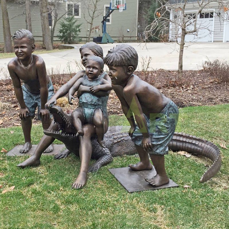 Children with crocodiles, children sculptures