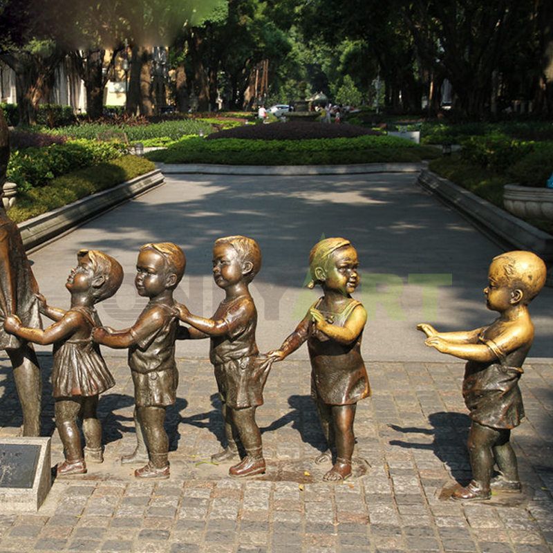 A group of children were paddling in the water