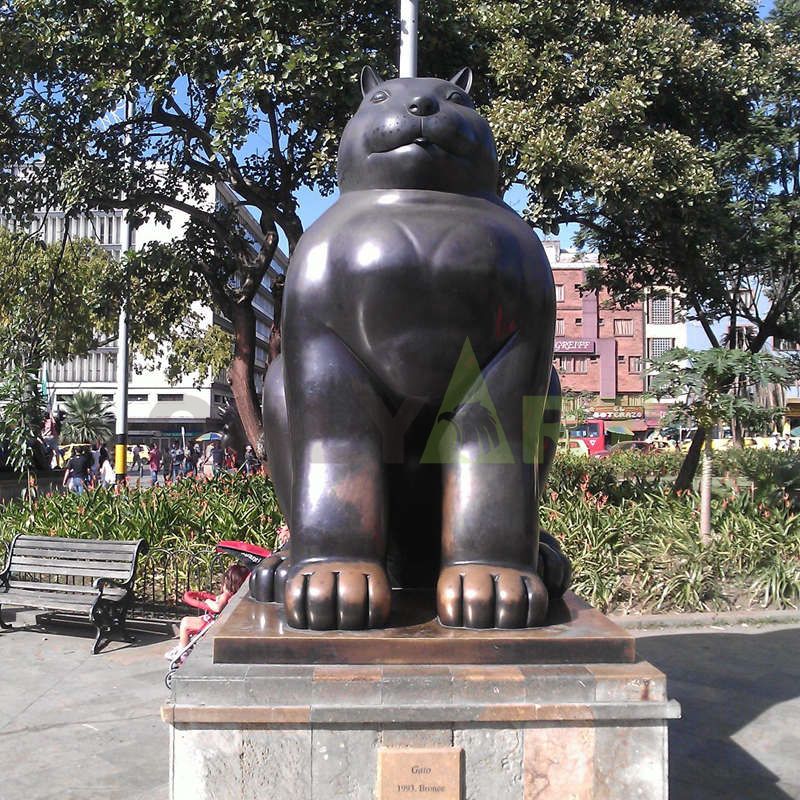 Standing fat cat looking straight at you sculpture