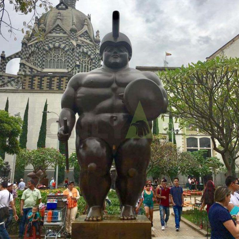 The standing portly woman is walking on the head sculpture