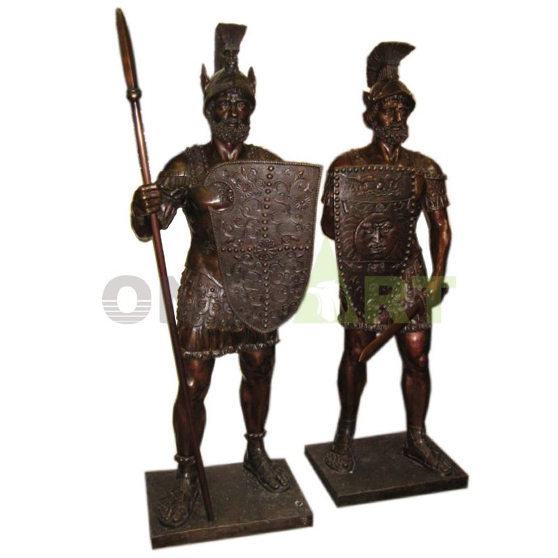 A life-size bronze statue of a Roman warrior carrying a shield and spear