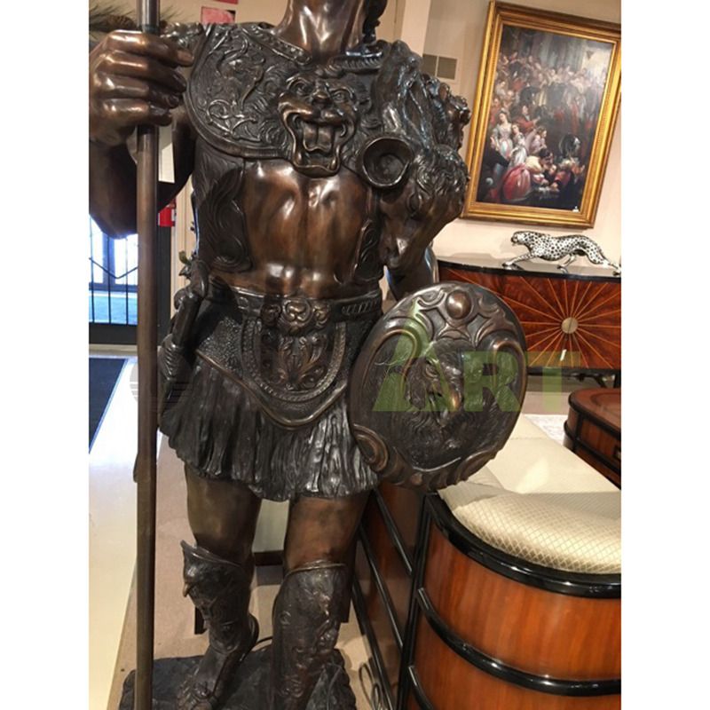 A statue of a Roman warrior with his head hidden
