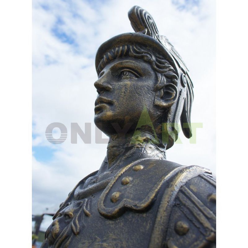 The bust of a Roman warrior against the blue sky