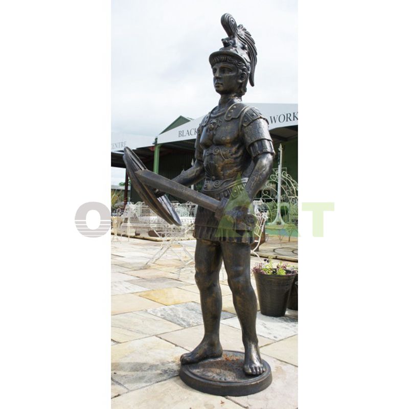 The bust of a Roman warrior against the blue sky