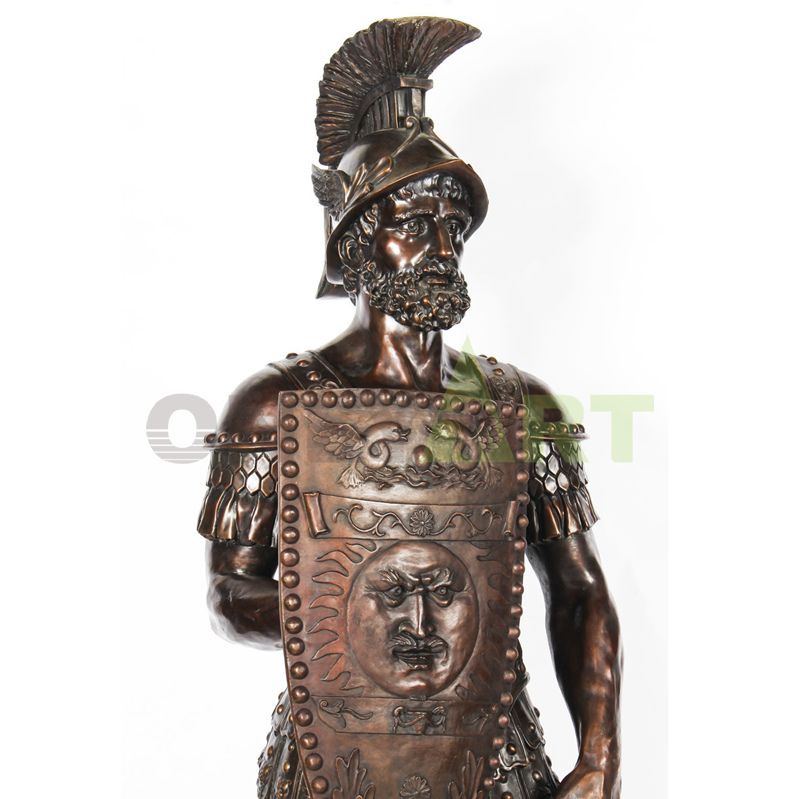 Sculpture of a Roman warrior holding a sun-patterned shield