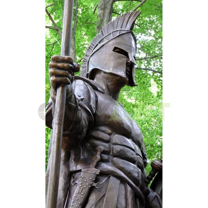 A statue of a Roman soldier in the shade of a tree