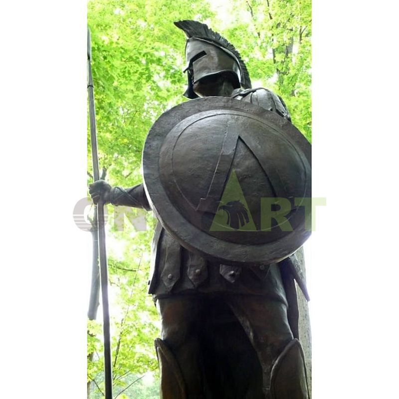 A statue of a Roman soldier in the shade of a tree