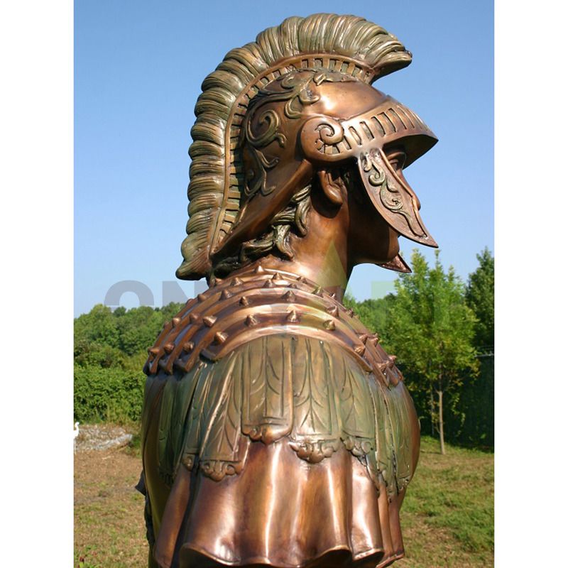 Sculpture of a tight-lipped Roman soldier detailing a helmet