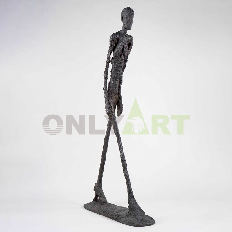 Man walking with his head down - Giacometti works