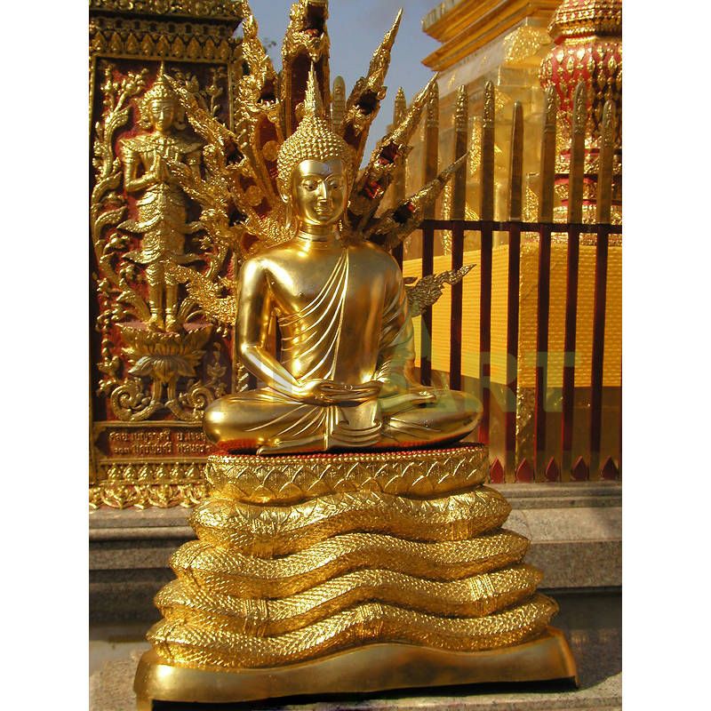 A bronze sculpture of a young Buddhist abbot