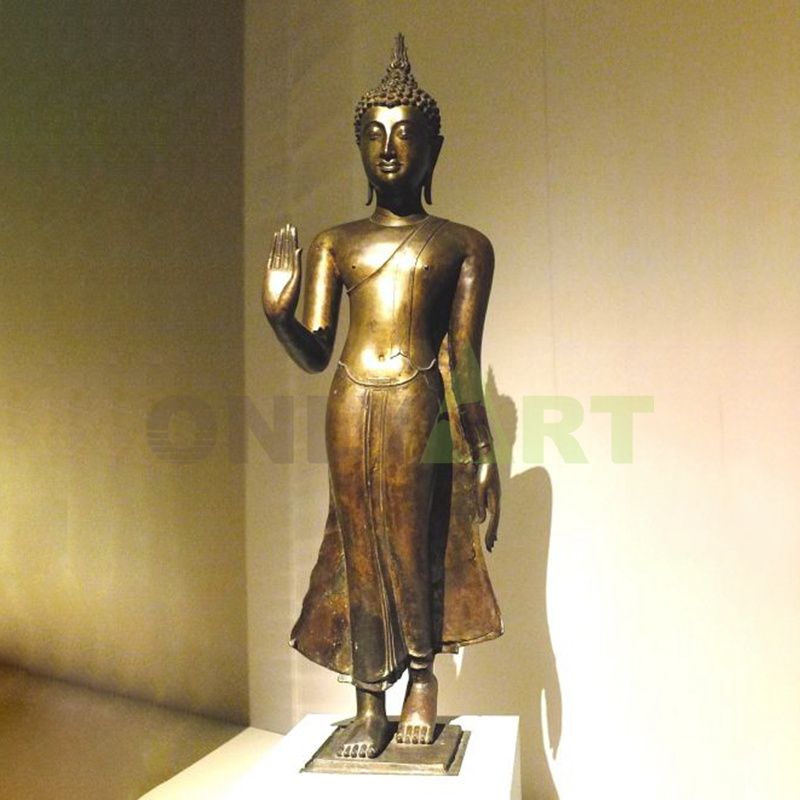 Standing bronze buddhas for sale inside