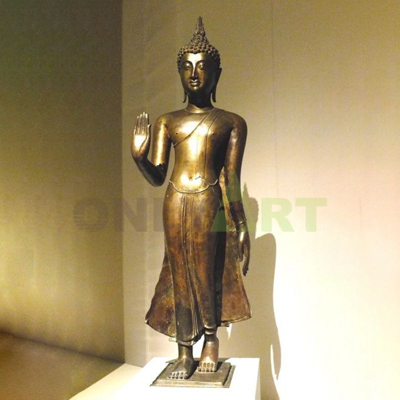 Standing bronze buddhas for sale inside