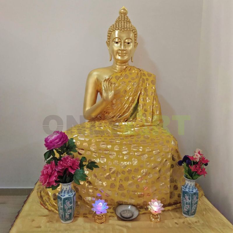 A giant Buddha statue in a Temple in Thailand