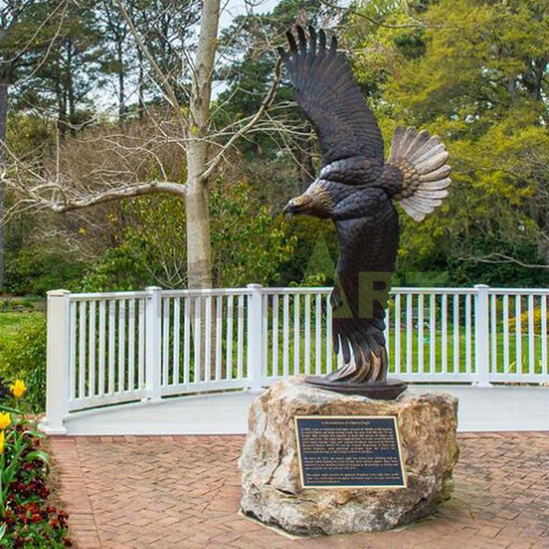 Custom-made bronze eagle flying sideways in metal