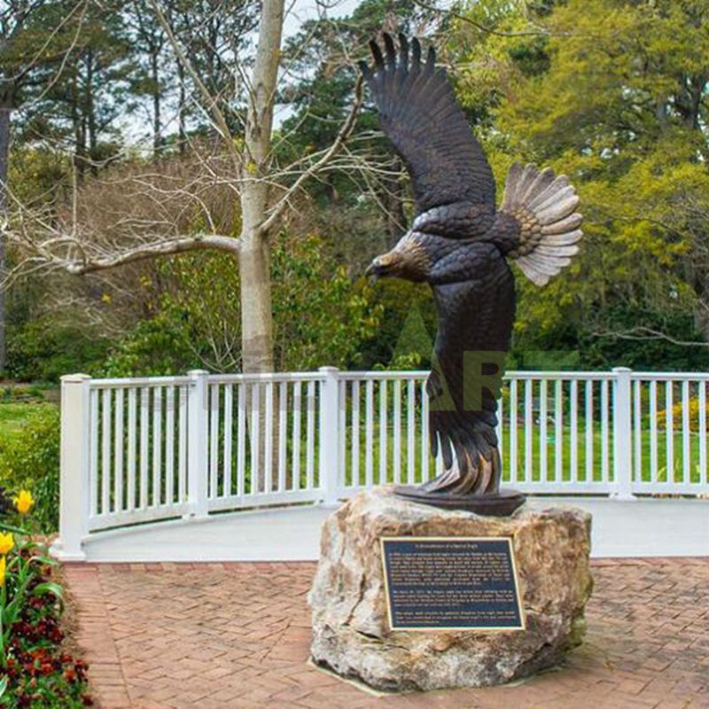 Custom-made bronze eagle flying sideways in metal