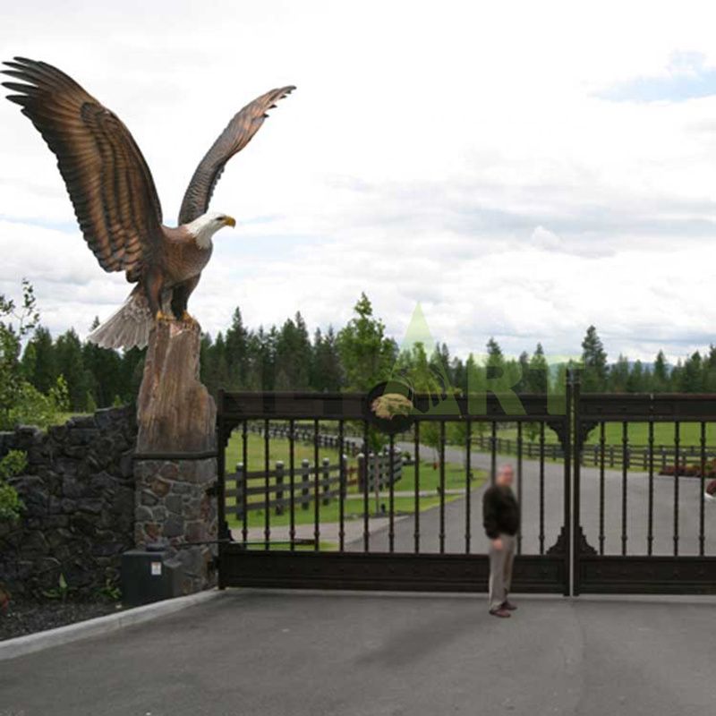 A pair of large bronze eagles are at the entrance to the outdoor courtyard