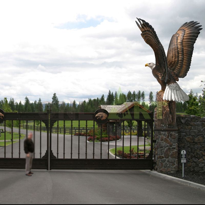 A pair of large bronze eagles are at the entrance to the outdoor courtyard