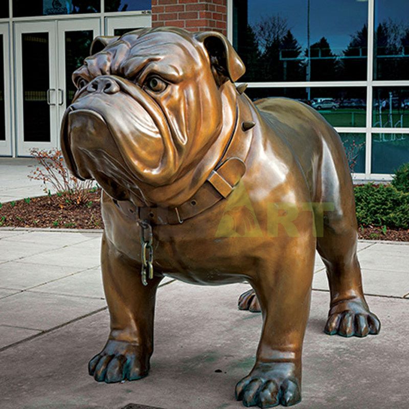 A large, muscular bulldog sculpture