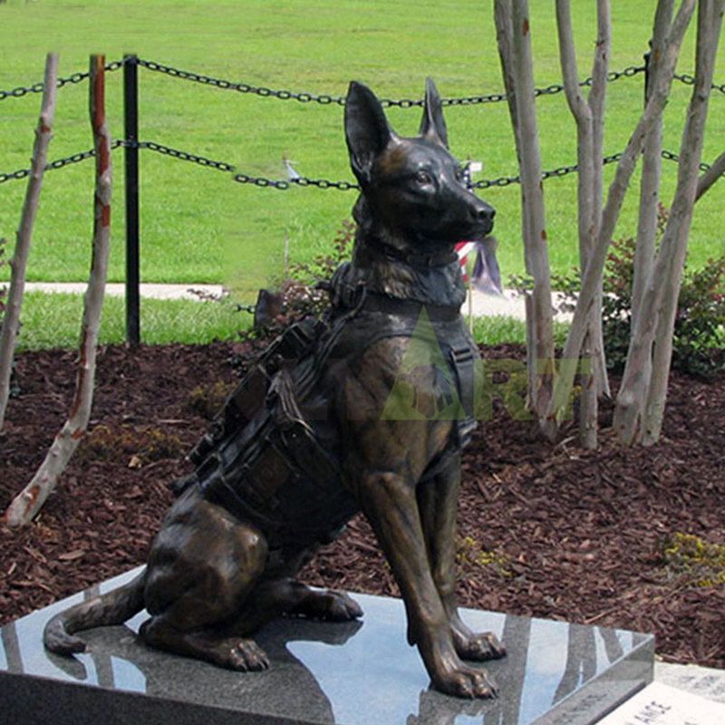 Bronze sculpture of a large Wolf dog crouching
