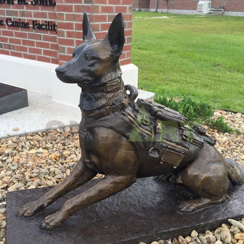 Bronze sculpture of a large Wolf dog crouching