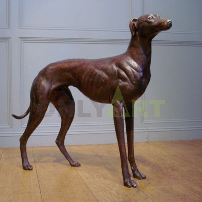 A bronze statue of a scrawny dog
