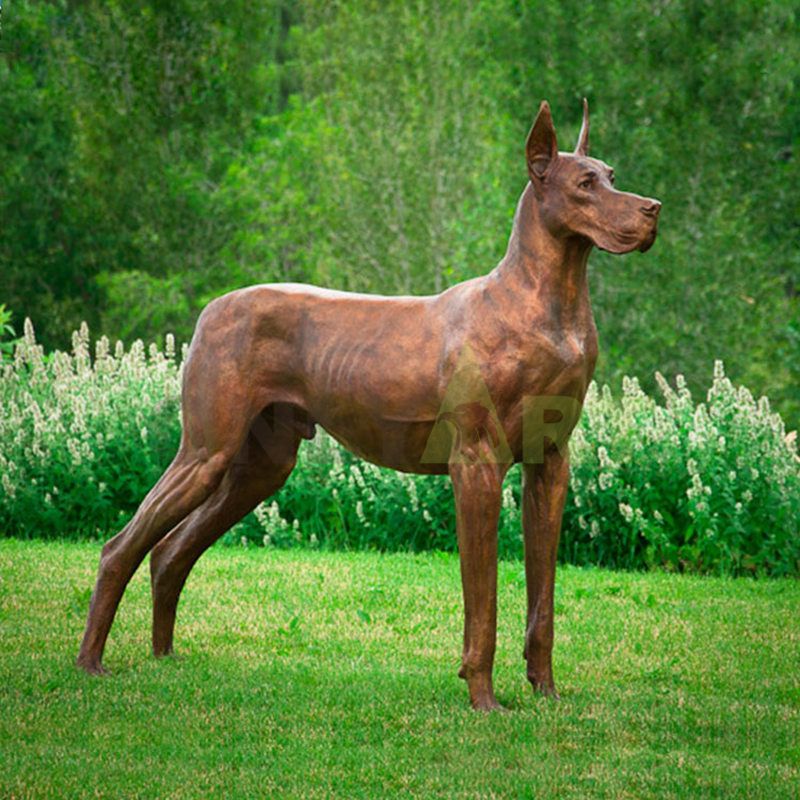 A bronze statue of a scrawny dog