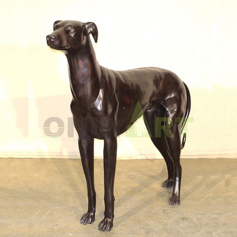 A bronze statue of a scrawny dog