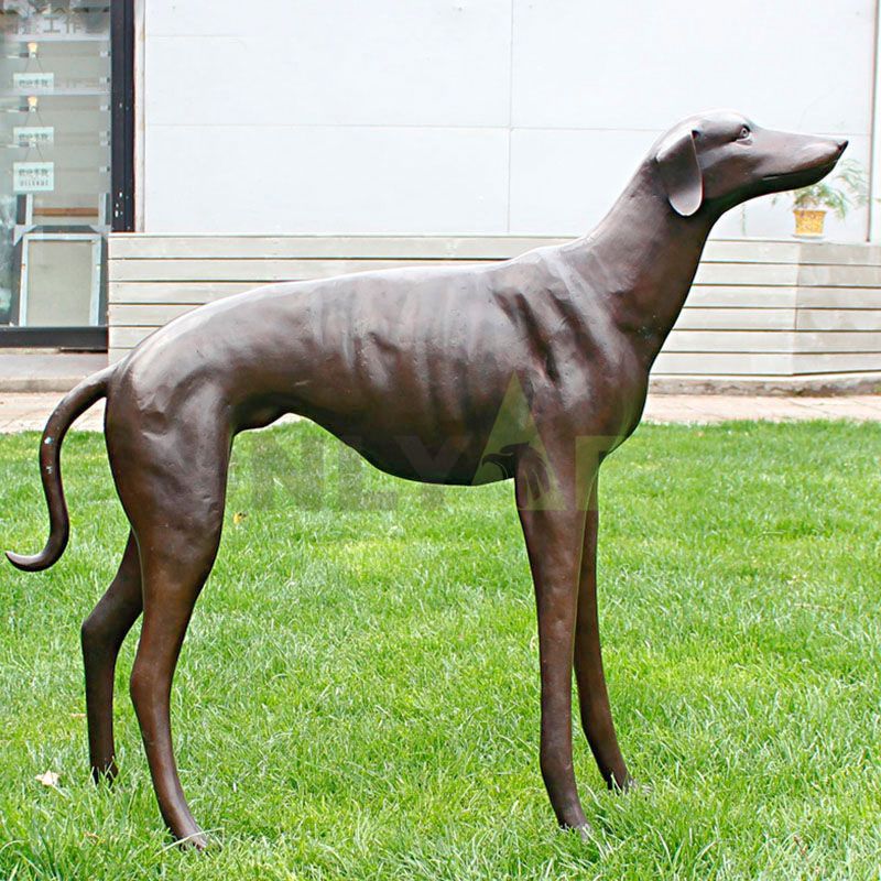 Bronze sculpture of the smooth body of a golden indoor long-waisted dog