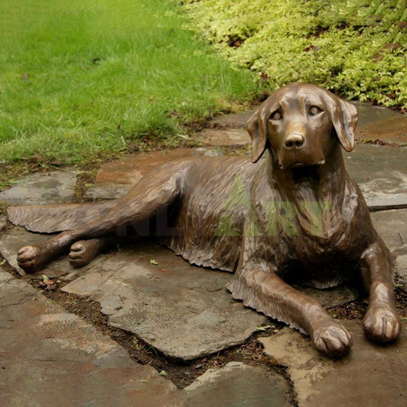 A bronze sculpture of a long-eared dog and her baby