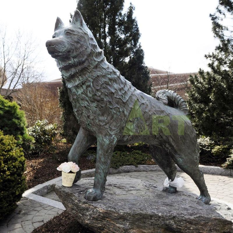 Home mounted bronze statue of two lovely German shepherds