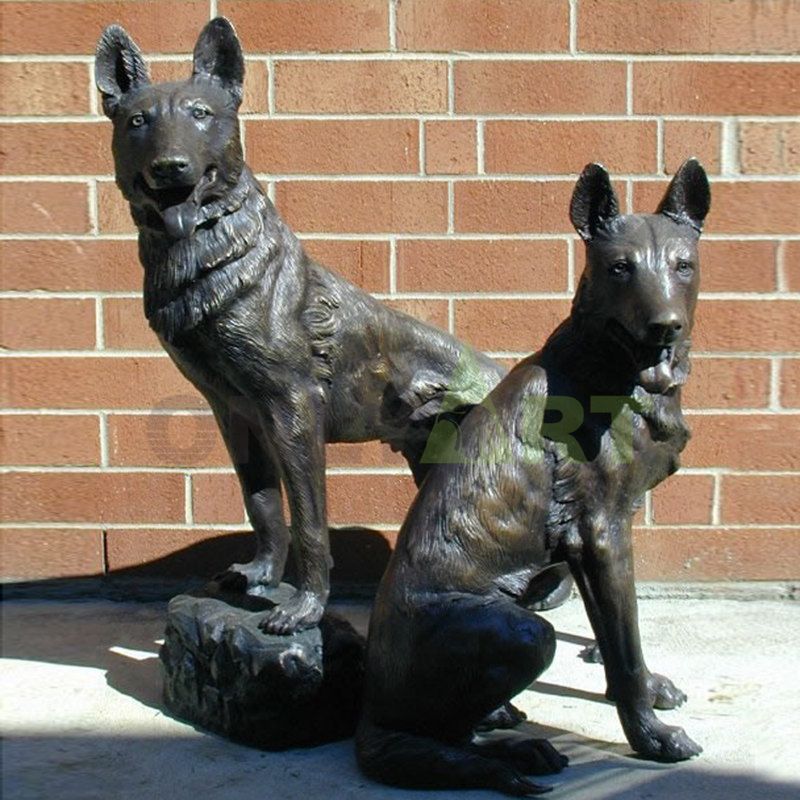Home mounted bronze statue of two lovely German shepherds