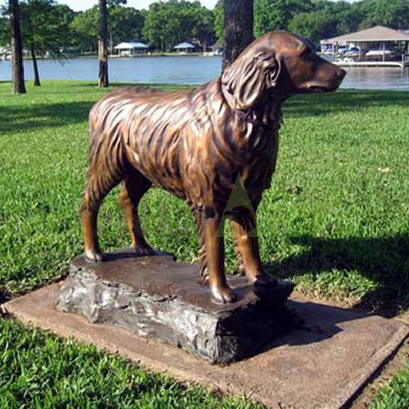 Look up at the sculpture of two Doberman pinschers