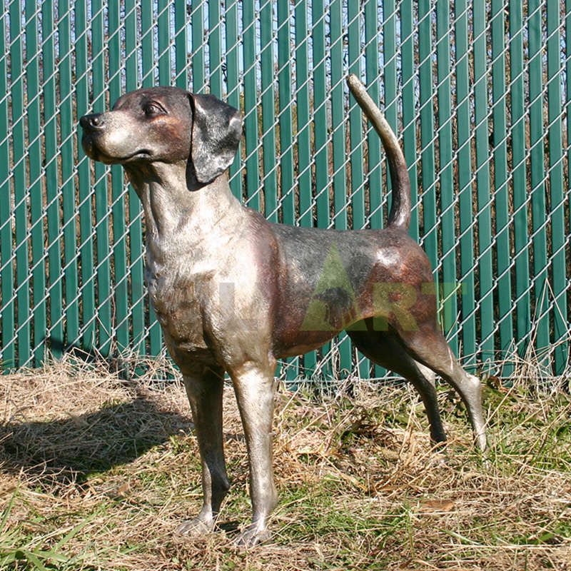 Look up at the sculpture of two Doberman pinschers