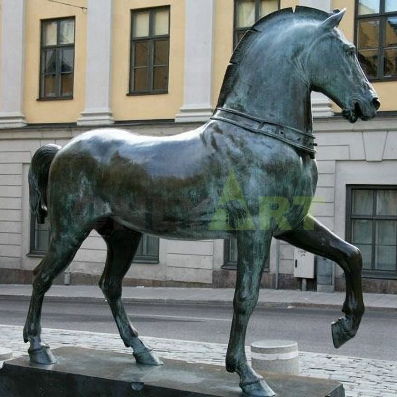 The knight and his steed are in front of the castle