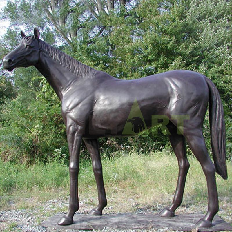 A statue of a quiet mane horse with its head tilted