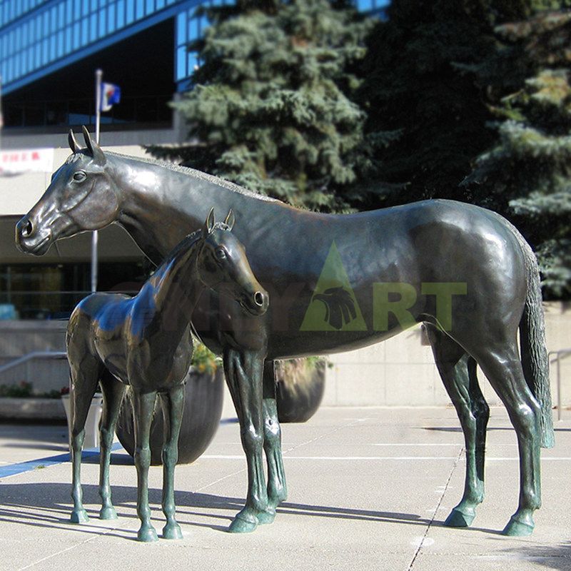 A statue of a quiet mane horse with its head tilted