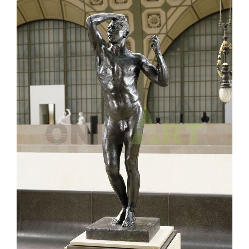 A bronze statue of a drunk man standing naked inside