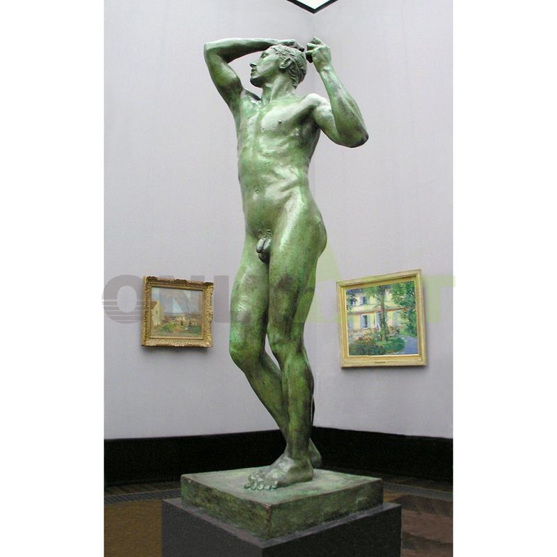 Bronze sculpture of bathing male with a head on his arm