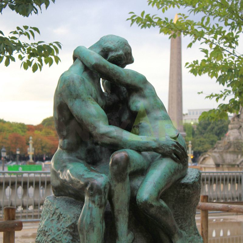 Antique bronze statue of Rodin kissing