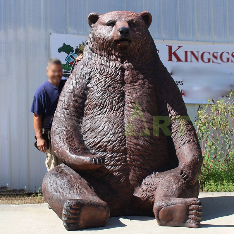 Little bear cubs with their mother in a bronze sculpture